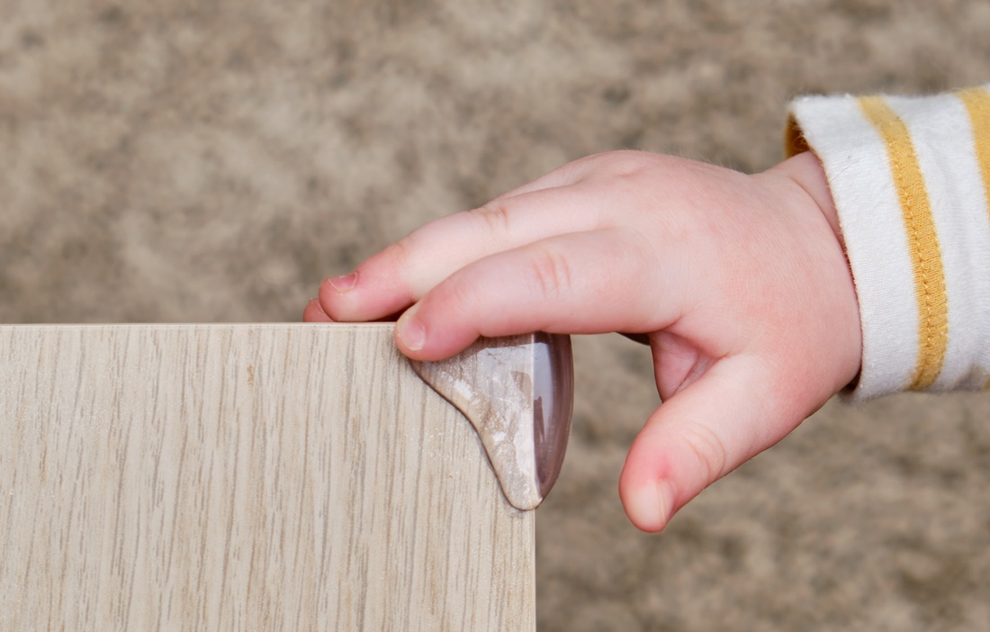 Safe furniture for children: adhesive corner protectors